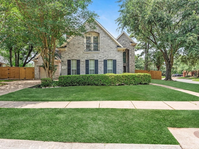20211 Sunrise Glen Ct, Spring, TX 77379 - view of front of property featuring brick siding and a gate