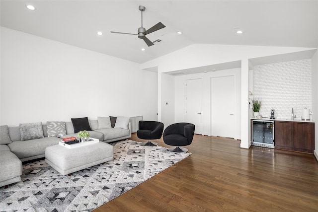 509 W Drew St, Houston, TX 77006 - living room with beverage cooler, bar, wood finished floors, ceiling fan, and lofted ceiling