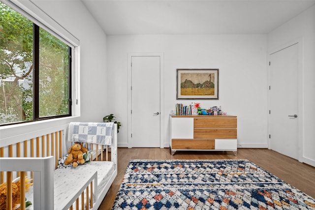 509 W Drew St, Houston, TX 77006 - bedroom featuring wood finished floors