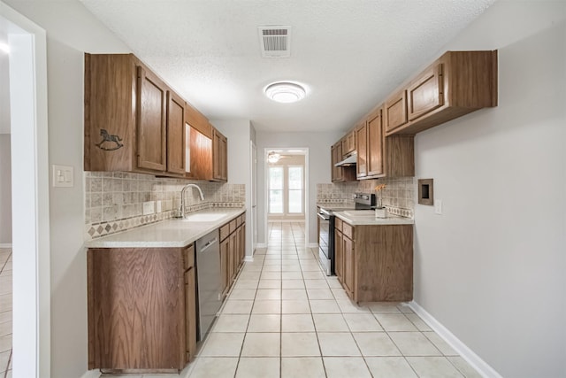 22519 Elkana Deane Ln, Katy, TX 77449 - kitchen featuring range with electric stovetop, a sink, stainless steel dishwasher, tasteful backsplash, and light countertops