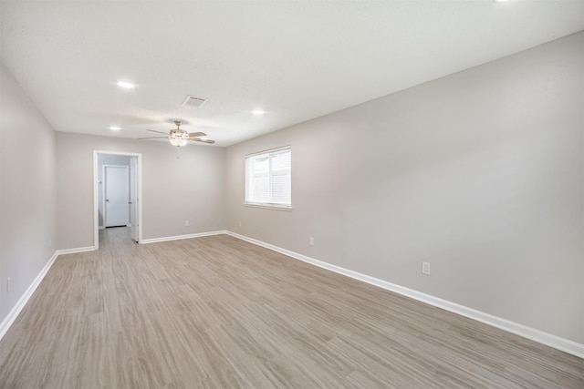 22519 Elkana Deane Ln, Katy, TX 77449 - unfurnished room featuring ceiling fan, baseboards, light wood finished floors, and recessed lighting