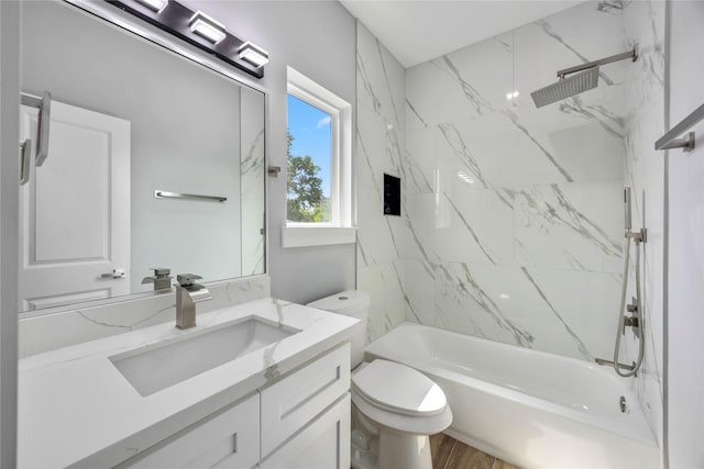 4923 Golden Forest St Unit A, Houston, TX 77091 - full bath featuring toilet, bathing tub / shower combination, vanity, and wood finished floors