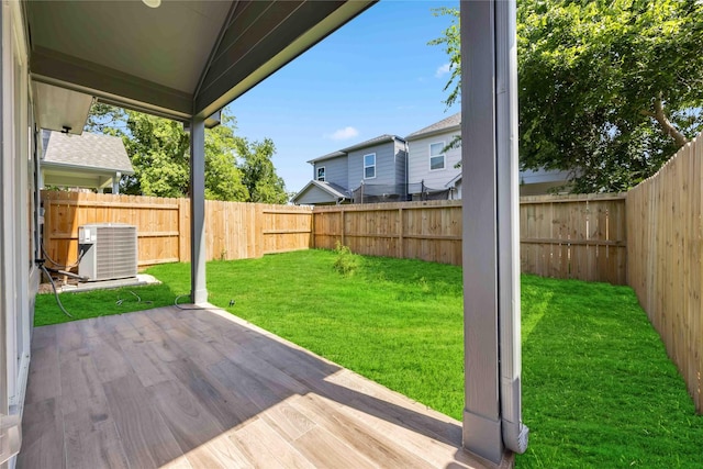 4923 Golden Forest St Unit A, Houston, TX 77091 - view of yard with central AC and a patio area