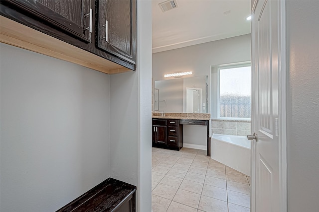 30806 Academy Trace Dr, Spring, TX 77386 - full bath featuring tile patterned flooring, vanity, and a bath