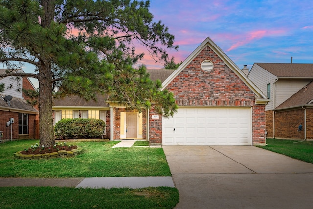 3031 W Cedar Sun Trl, Katy, TX 77449 - traditional-style house with driveway, an attached garage, a front lawn, and brick siding