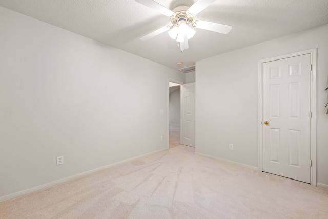 3031 W Cedar Sun Trl, Katy, TX 77449 - unfurnished bedroom featuring light carpet, baseboards, and ceiling fan