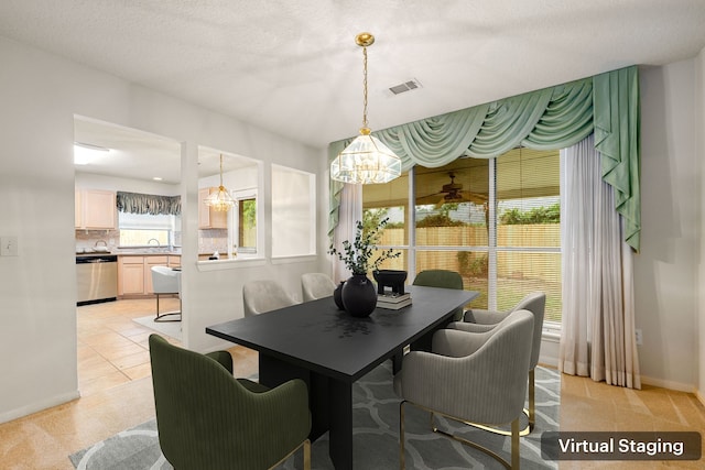 3031 W Cedar Sun Trl, Katy, TX 77449 - dining space with a chandelier and baseboards
