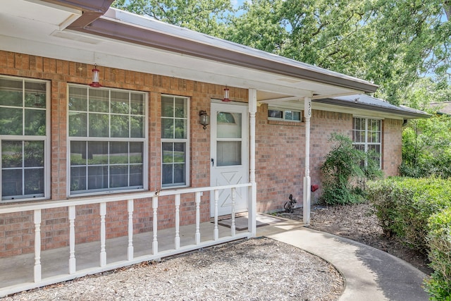 36 Jamaica Ln, Normangee, TX 77871 - entrance to property featuring a porch and brick siding