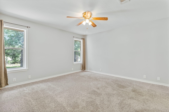 36 Jamaica Ln, Normangee, TX 77871 - carpeted spare room featuring ceiling fan and baseboards