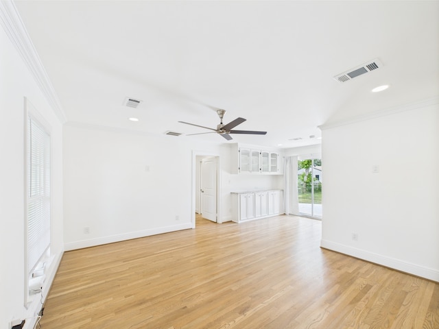 4927 Ward St, Houston, TX 77021 - unfurnished living room featuring ornamental molding, a ceiling fan, light wood-style flooring, baseboards, and recessed lighting