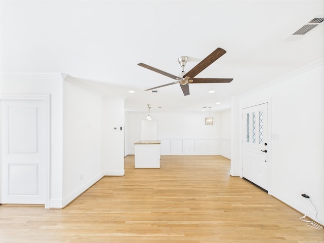 4927 Ward St, Houston, TX 77021 - spare room with a ceiling fan, crown molding, light wood-style flooring, recessed lighting, and baseboards