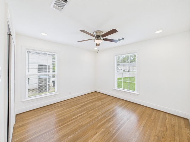 4927 Ward St, Houston, TX 77021 - unfurnished room featuring light wood-type flooring, baseboards, a ceiling fan, and recessed lighting