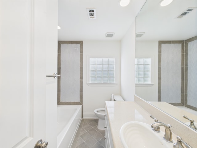 4927 Ward St, Houston, TX 77021 - bathroom featuring tile patterned flooring, toilet, baseboards, a bathtub, and vanity
