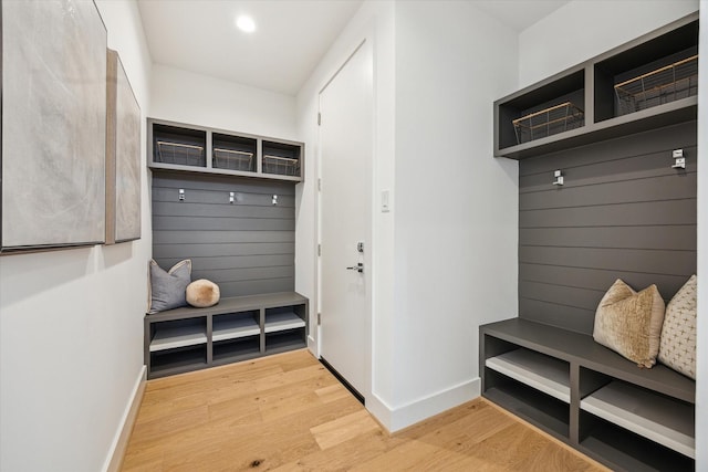 3851 Merrick St, Houston, TX 77025 - mudroom with wood finished floors, baseboards, and recessed lighting