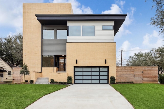3851 Merrick St, Houston, TX 77025 - view of front facade featuring brick siding, concrete driveway, and a garage