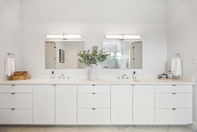 3851 Merrick St, Houston, TX 77025 - bathroom featuring double vanity and a shower