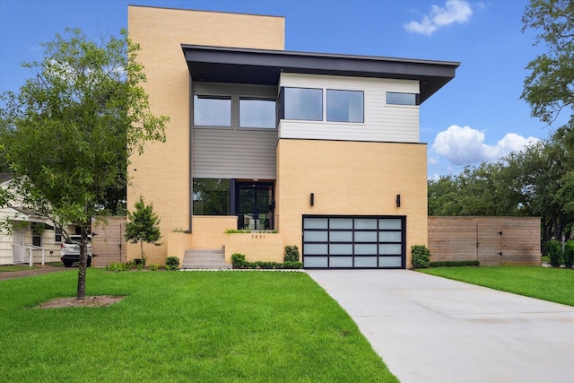 3851 Merrick St, Houston, TX 77025 - contemporary house featuring an attached garage, concrete driveway, and brick siding