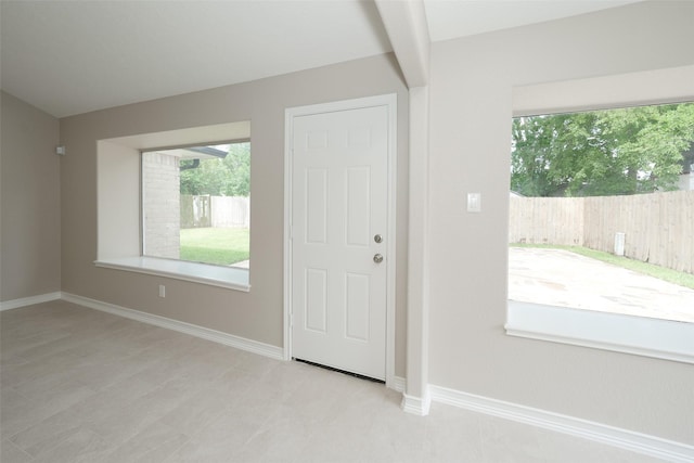 9607 Rumbling Wood Ln, Houston, TX 77086 - foyer entrance with baseboards