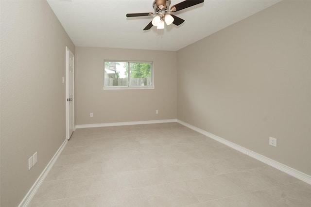 9607 Rumbling Wood Ln, Houston, TX 77086 - empty room with ceiling fan and baseboards