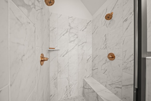 19002 Valentine Padlock Cir, Tomball, TX 77377 - bathroom featuring a tile shower and vaulted ceiling