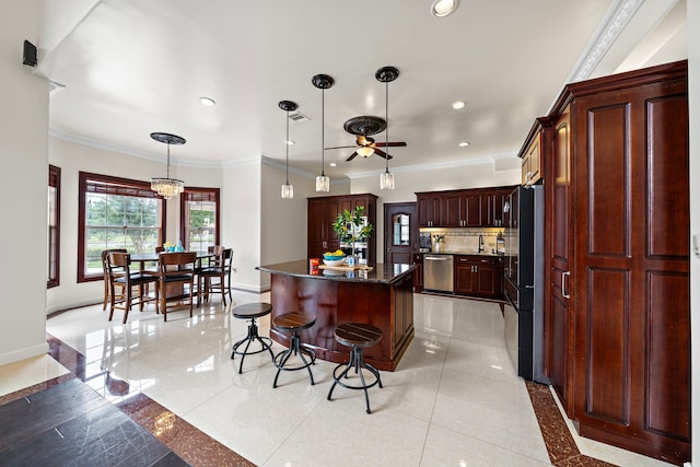 3818 Foolish Pleasure Ct, Richmond, TX 77406 - kitchen with stainless steel dishwasher, a breakfast bar area, baseboards, ceiling fan, and crown molding