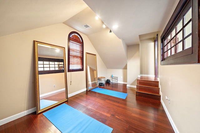 3818 Foolish Pleasure Ct, Richmond, TX 77406 - exercise area with lofted ceiling, wood finished floors, healthy amount of natural light, and baseboards