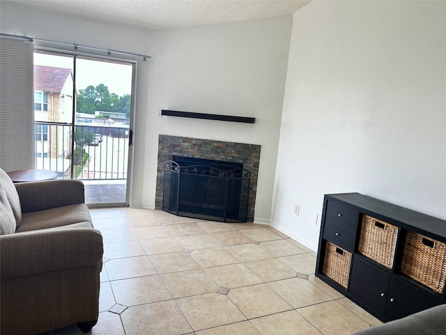 12550 Whittington Dr Unit 712, Houston, TX 77077 - living area with a fireplace and light tile patterned flooring