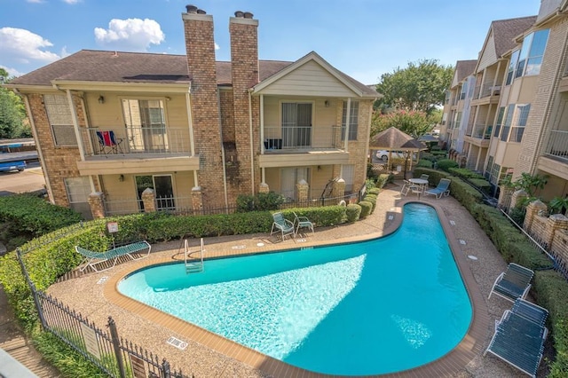 12550 Whittington Dr Unit 712, Houston, TX 77077 - community pool featuring a patio