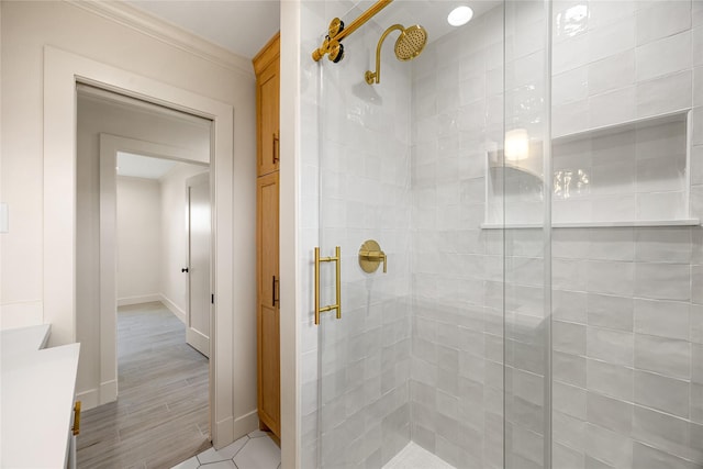 1041 Gardendale Dr, Houston, TX 77018 - bathroom featuring a stall shower, crown molding, baseboards, and vanity