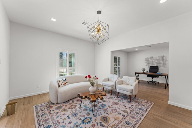 322 N Wilcrest Dr, Houston, TX 77079 - living area featuring an office area, a chandelier, wood finished floors, recessed lighting, and baseboards