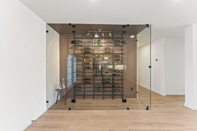 322 N Wilcrest Dr, Houston, TX 77079 - wine room featuring wood finished floors and baseboards