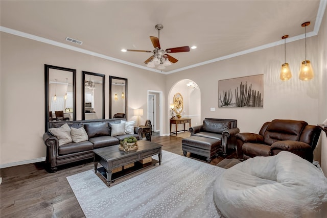 312 Fox Xing, Burnet, TX 78611 - living room featuring arched walkways, recessed lighting, ceiling fan, baseboards, and wood finished floors