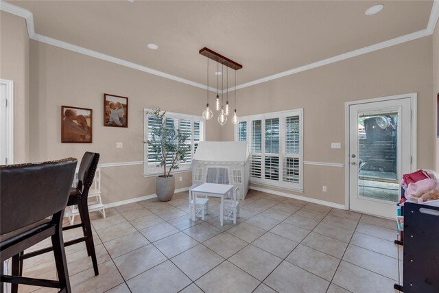 312 Fox Xing, Burnet, TX 78611 - dining space featuring light tile patterned floors, ornamental molding, baseboards, and recessed lighting