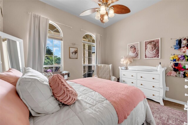 312 Fox Xing, Burnet, TX 78611 - carpeted bedroom featuring ceiling fan and baseboards