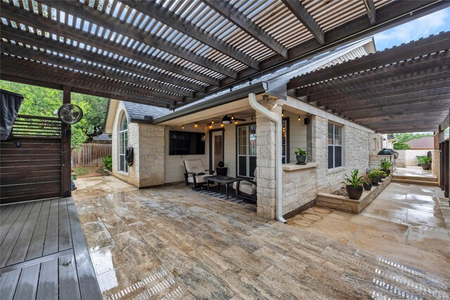 312 Fox Xing, Burnet, TX 78611 - wooden deck with a fenced backyard, a patio, a pergola, and a ceiling fan