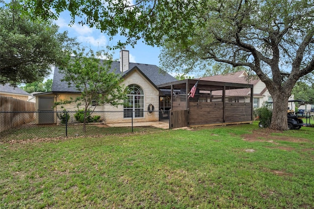 312 Fox Xing, Burnet, TX 78611 - back of property featuring a chimney and stone siding