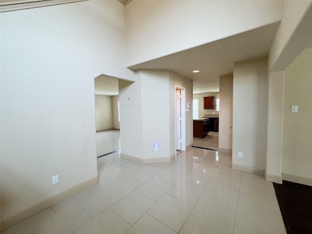 20516 Hawkins Manor Ln, Katy, TX 77449 - unfurnished room with light marble finish floors, baseboards, and recessed lighting