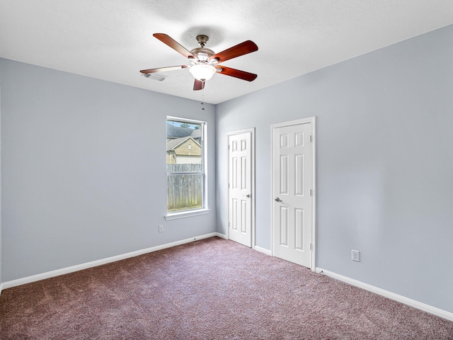 25203 Auburn Terrace Dr, Spring, TX 77389 - unfurnished bedroom with carpet, baseboards, and ceiling fan