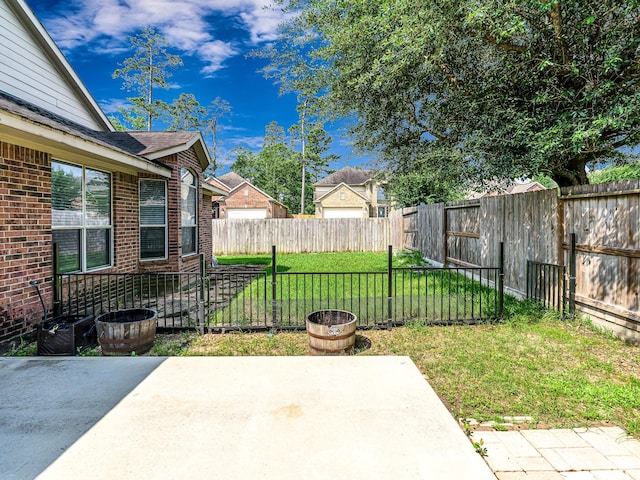 25203 Auburn Terrace Dr, Spring, TX 77389 - view of yard featuring a patio