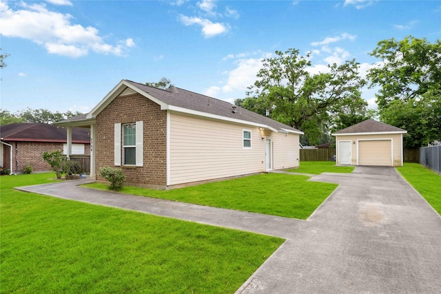 2709 Virginia St, La Marque, TX 77568 - view of property exterior featuring a detached garage, an outdoor structure, and brick siding