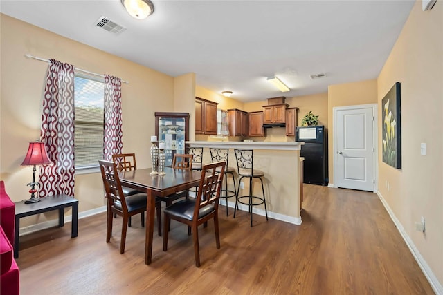 2709 Virginia St, La Marque, TX 77568 - dining room with wood finished floors and baseboards