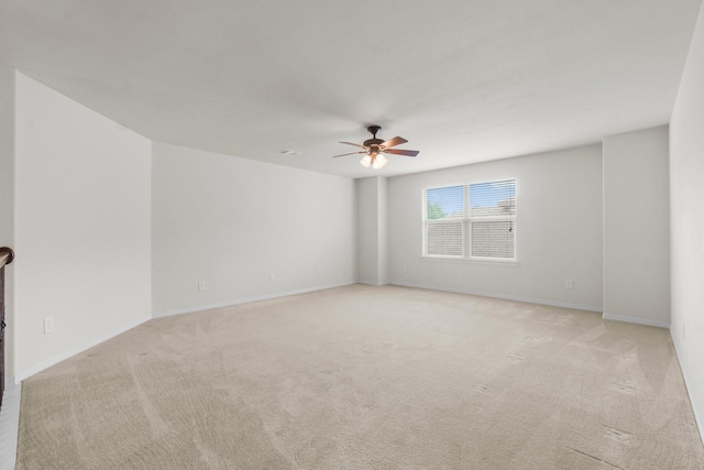 9131 Durango Point Ln, Houston, TX 77070 - spare room with a ceiling fan, light colored carpet, and baseboards