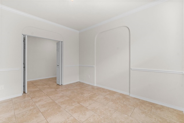 9131 Durango Point Ln, Houston, TX 77070 - spare room with ornamental molding, light tile patterned flooring, and baseboards