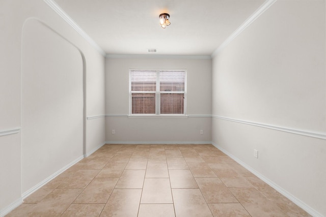 9131 Durango Point Ln, Houston, TX 77070 - spare room with ornamental molding, light tile patterned floors, and baseboards