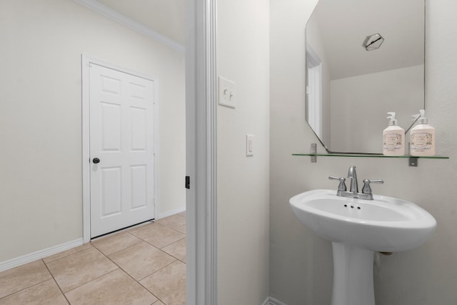 9131 Durango Point Ln, Houston, TX 77070 - bathroom with crown molding, tile patterned flooring, and baseboards