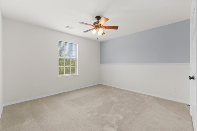 9131 Durango Point Ln, Houston, TX 77070 - spare room with light carpet, a ceiling fan, and baseboards