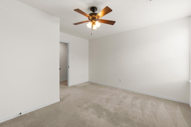 9131 Durango Point Ln, Houston, TX 77070 - unfurnished room with light carpet, ceiling fan, and baseboards