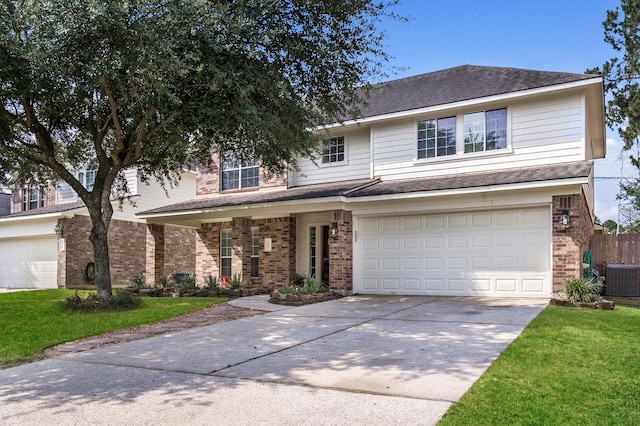 6907 Autumn Rain Ln, Spring, TX 77379 - view of front of house with concrete driveway, a garage, cooling unit, brick siding, and roof with shingles