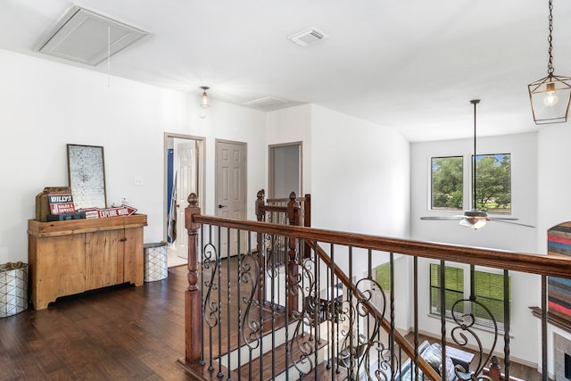 6907 Autumn Rain Ln, Spring, TX 77379 - hallway with attic access, an upstairs landing, and dark wood-style floors