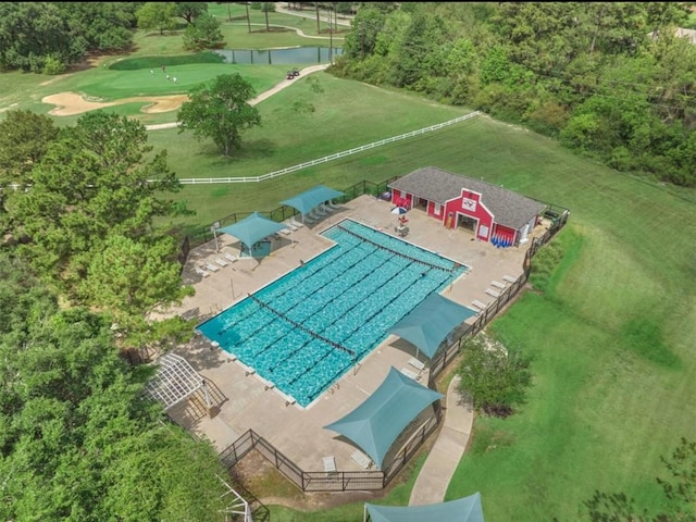 6907 Autumn Rain Ln, Spring, TX 77379 - view of subject property featuring a large body of water, a pool, and a golf club
